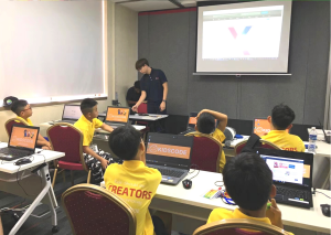 Primary school children watching an InfoComm presentation