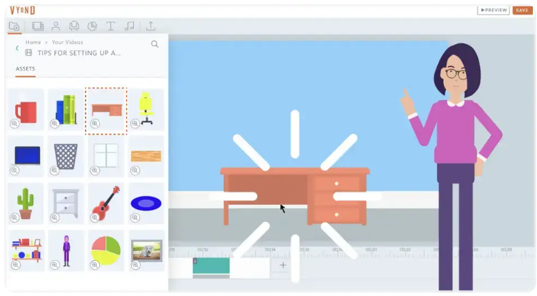 Vyond Studio interface showing asset library with selected furniture icon and animated character pointing toward a highlighted desk